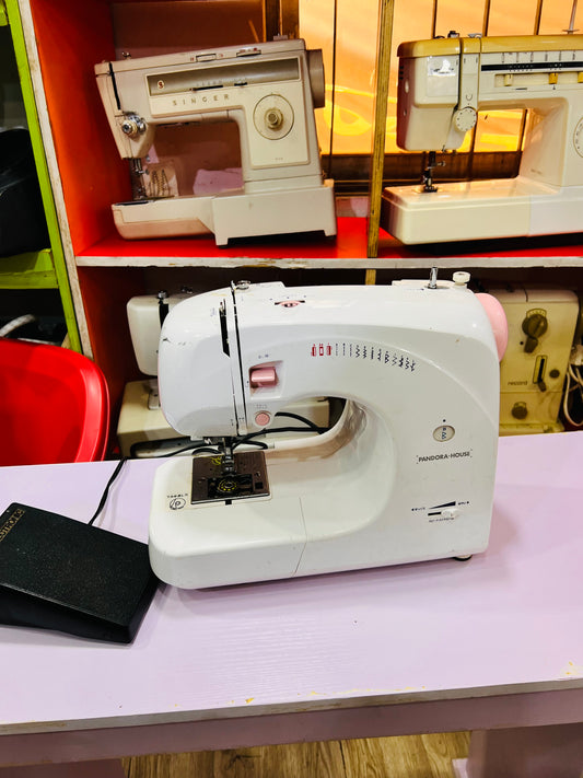 Electric sewing machines